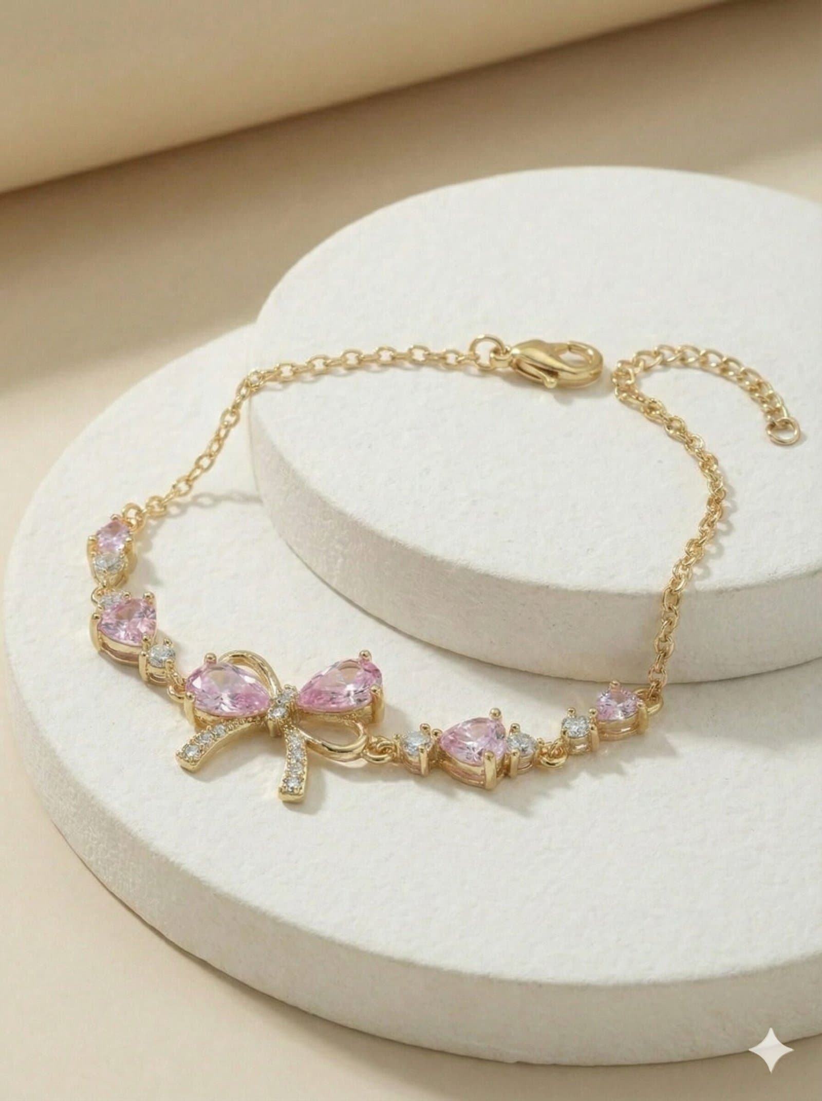 Gold-Tone Adjustable Chain Bracelet with Pink Teardrop Stones and Pave-Style Bow Charm — image 2