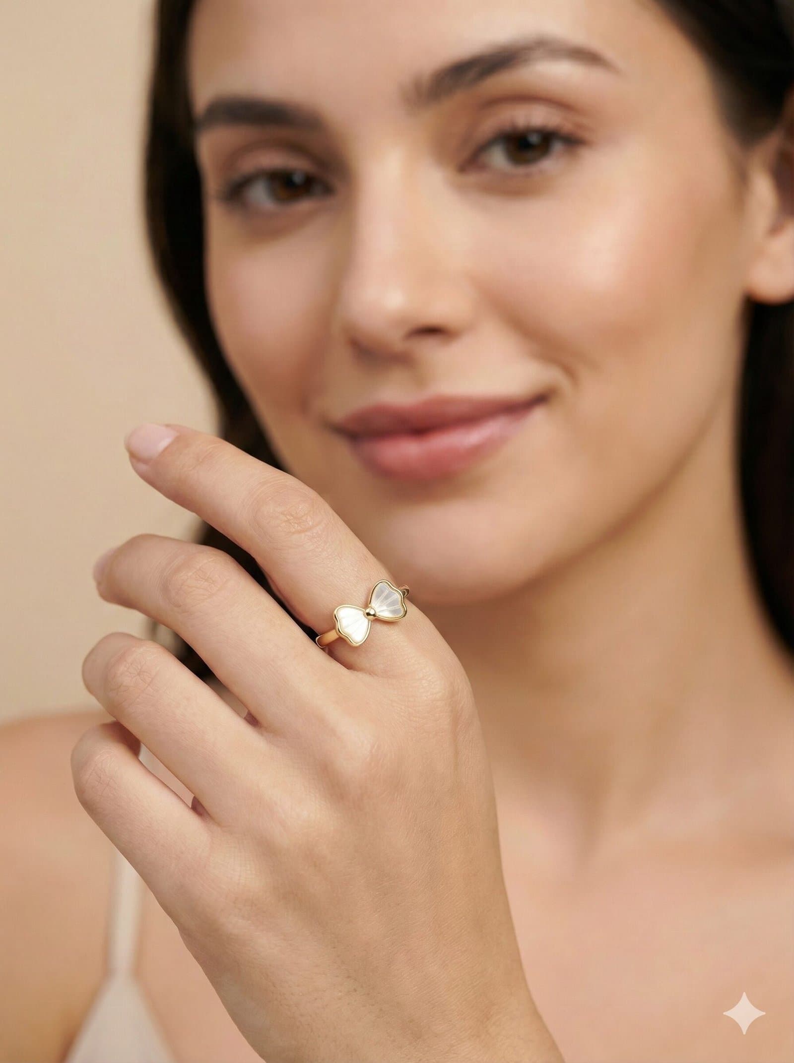 Elegant Gold-Tone Bow Ring with White Pearlescent Inlay and Radial Detailing — image 3