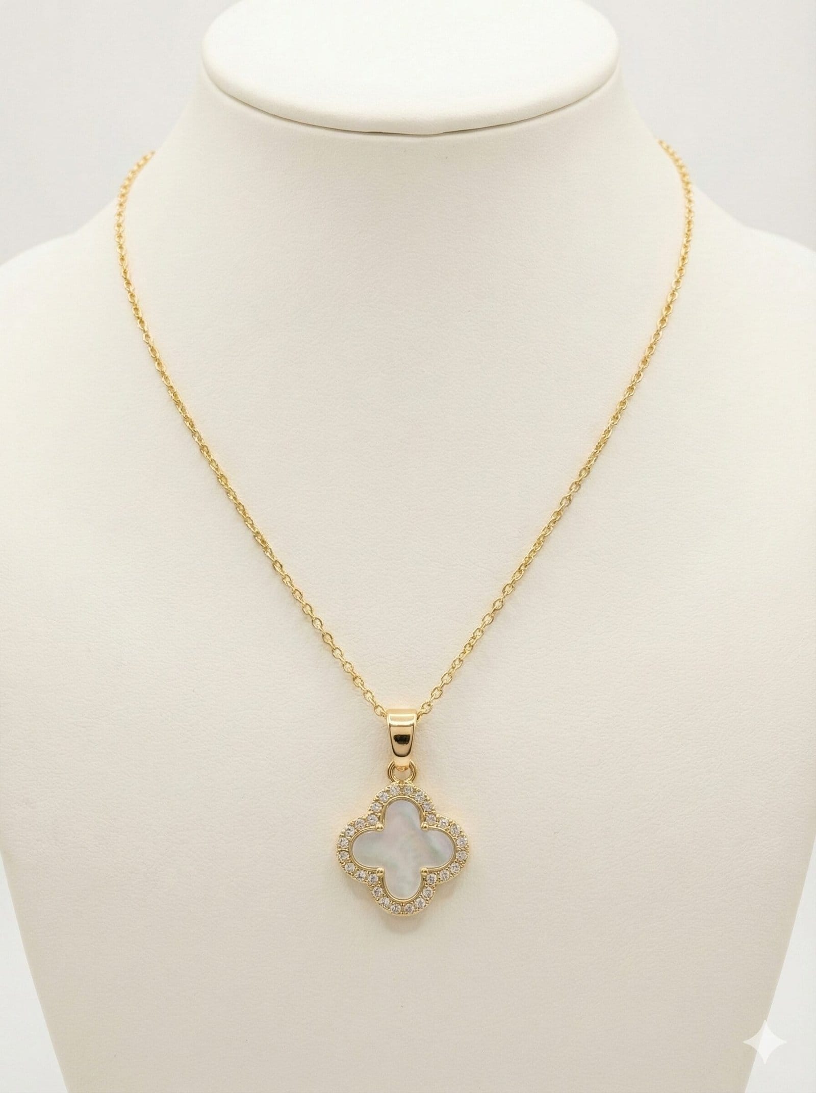 Gold-Tone Four-Leaf Clover Pendant Necklace with White Pearlescent Inlay and Crystal Halo Border