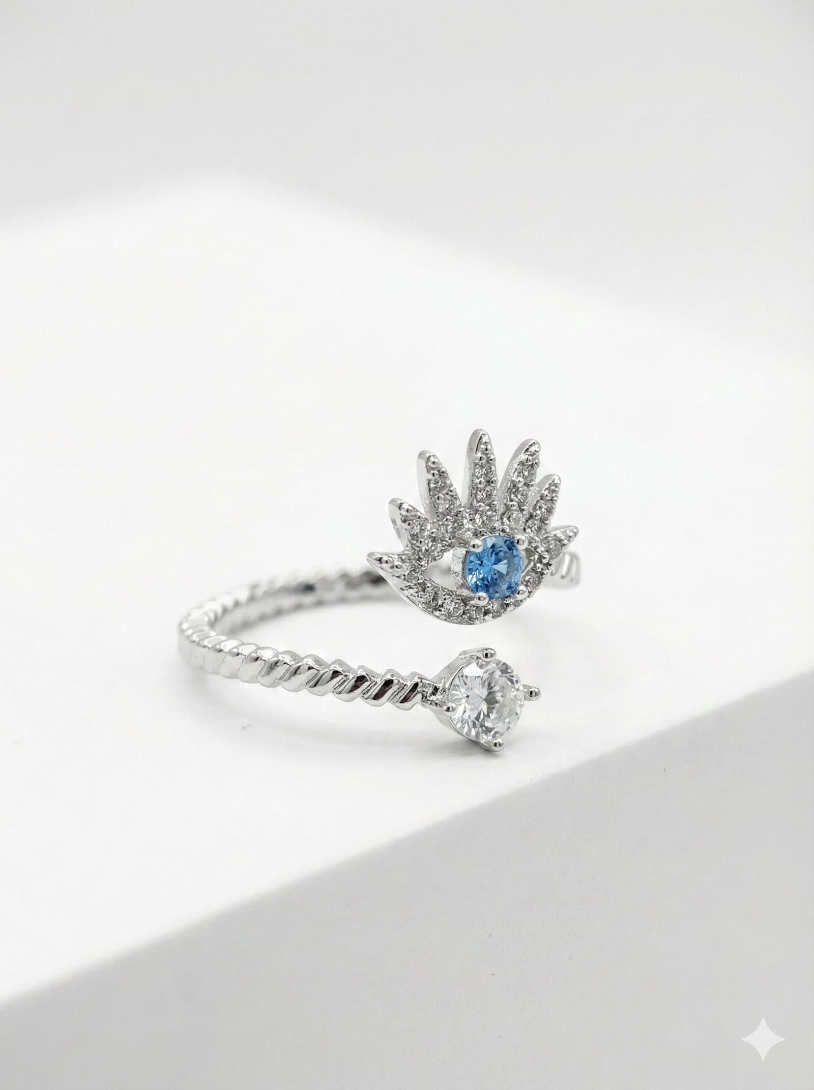Silver-Tone Twisted Open Ring with Pave Eye Motif and Blue Stone Center — image 3