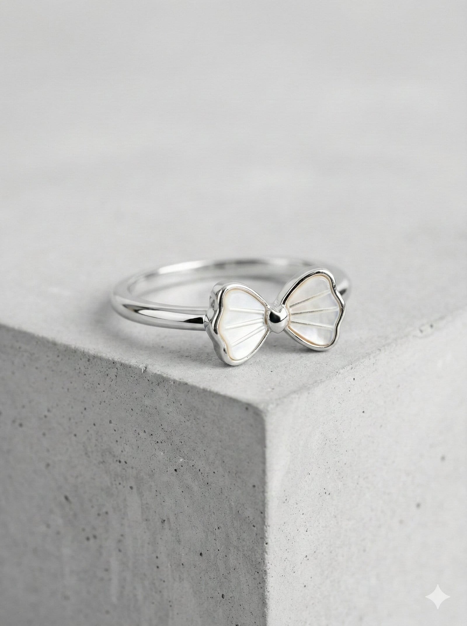 Silver Bow Ring with White Shell Inlay Detailing
