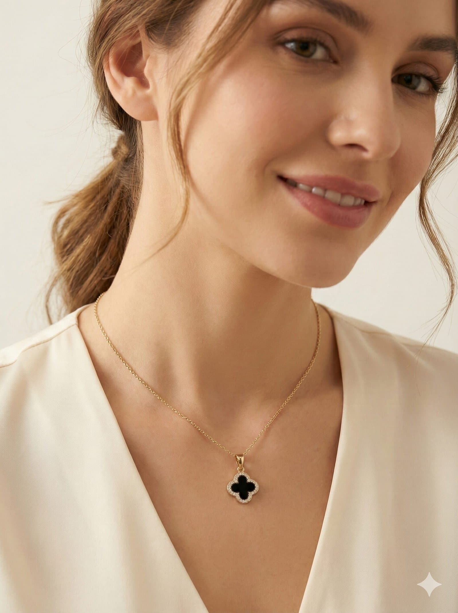 Gold-Tone Quatrefoil Pendant Necklace with Black Inlay and Crystal Halo — image 2