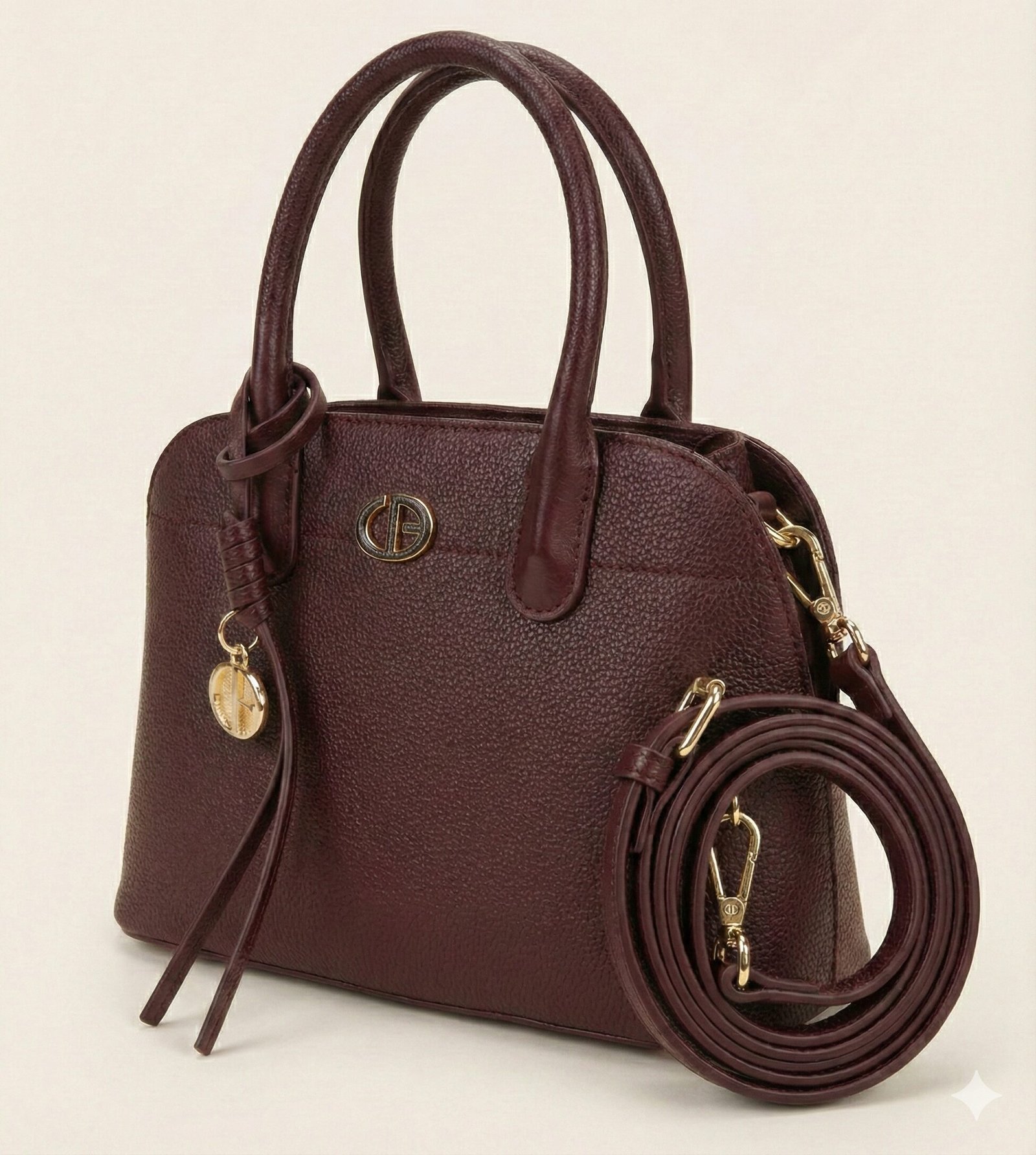 the pebbled dome satchel with charm – deep burgundy
